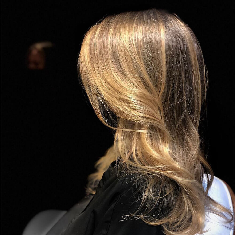 Light-brown bob with subtle dimension, seen from behind at Red Market New York