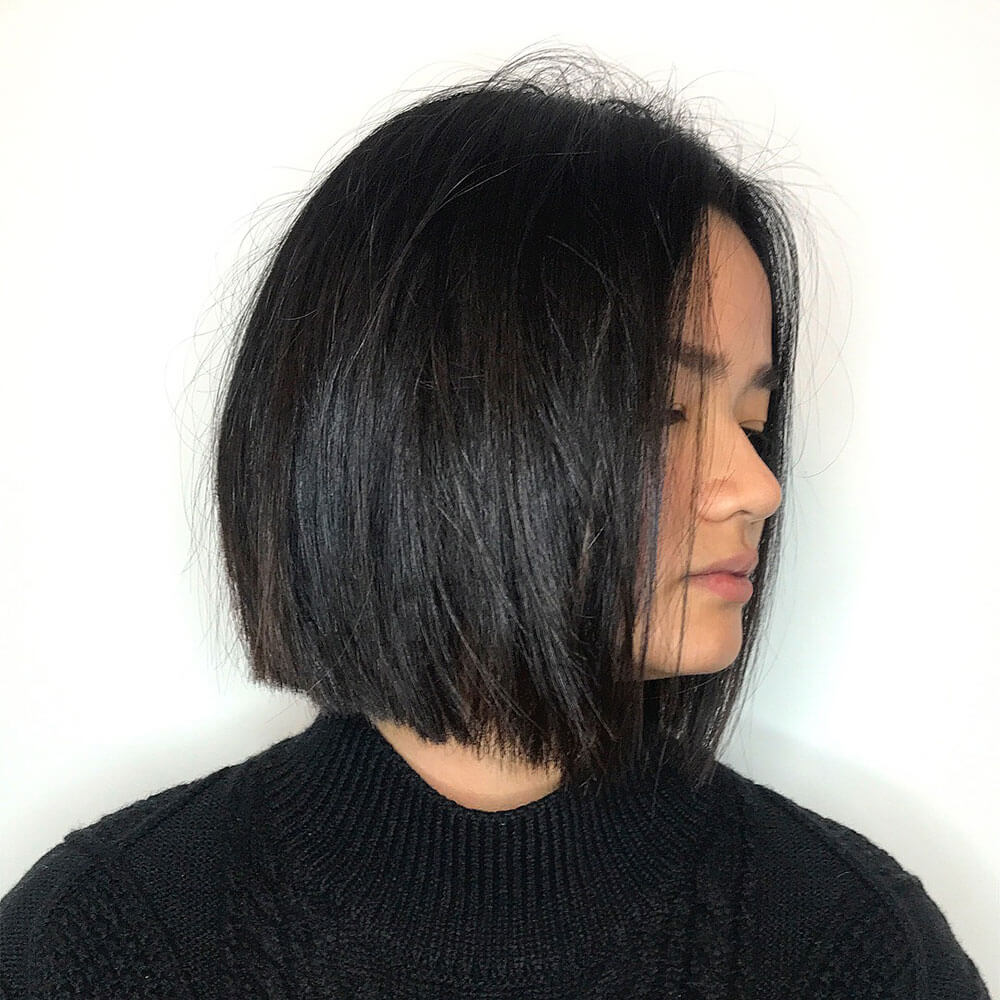 Glossy dark-brown bob with subtle dimension